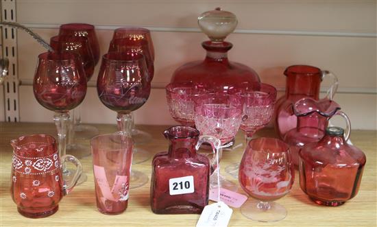 A quantity of cranberry glassware